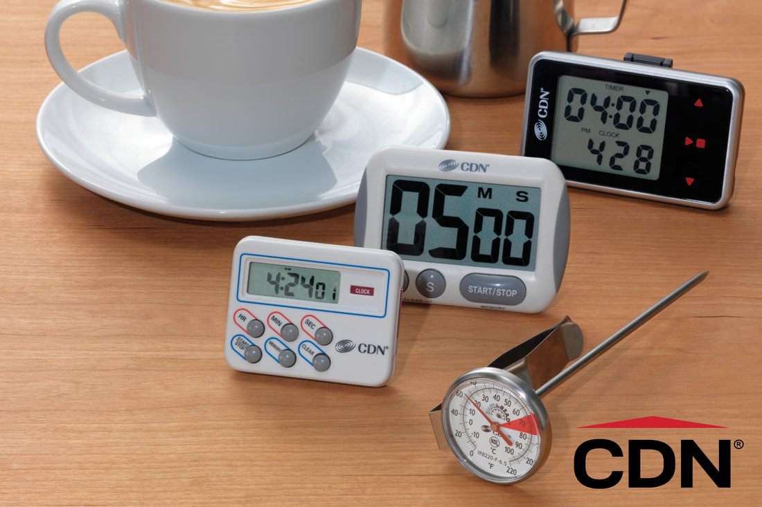 Coffee mugs with timers on a table